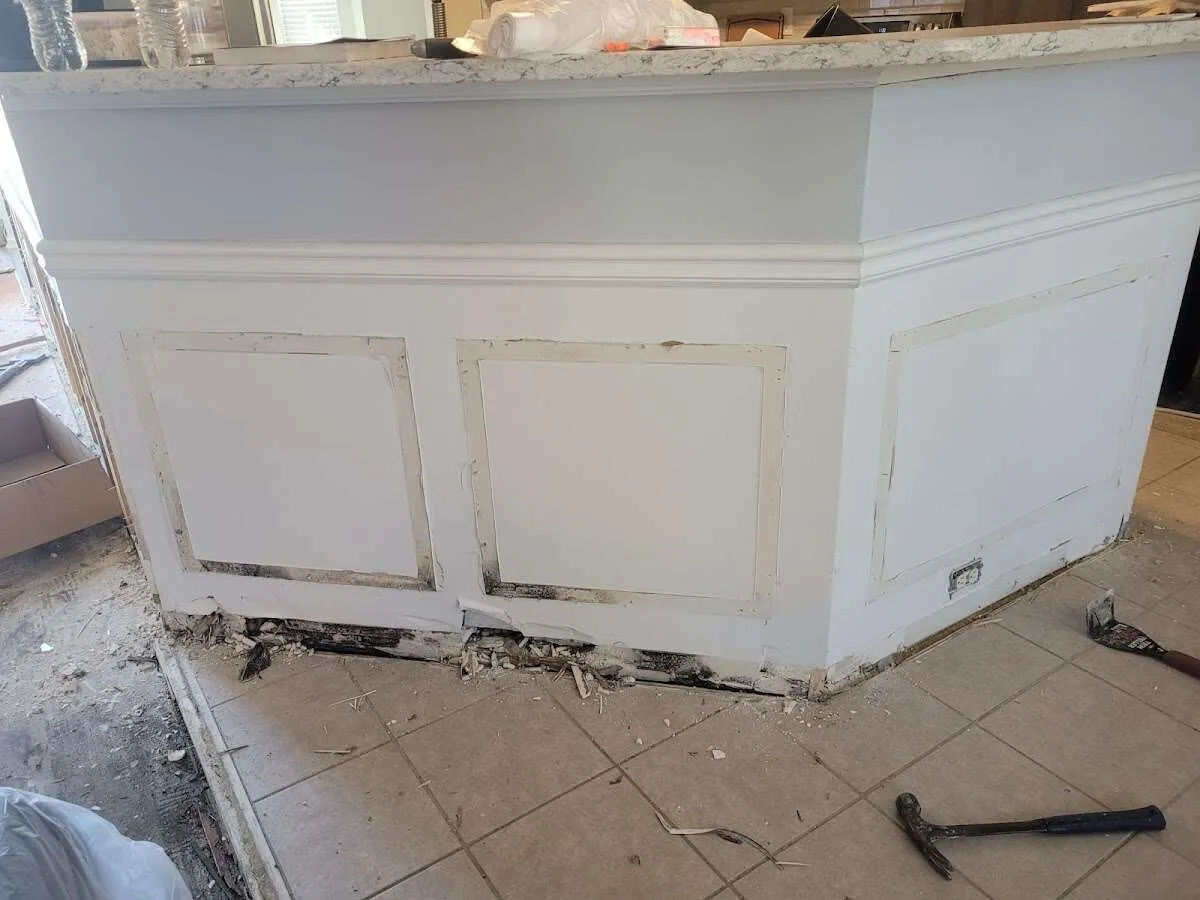 Water damage and mold on kitchen during Storm Damage Restoration in Vernon
